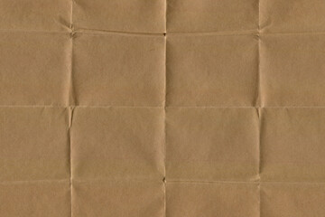 Brown Folded Paper Texture with subtle wrinkles and horizontal creases. Vintage Crumpled paper Background