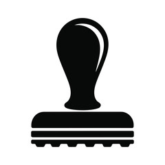 A black silhouette of a rubber stamp is shown against a white background.