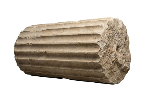 Ancient broken stone column fragment isolated. Historical architectural ruin.