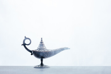 Ramadan themed image with dates, half moon and lamps. 