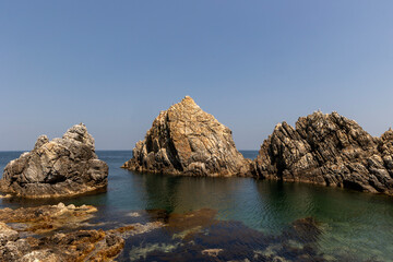 Naklejka premium rocky coast of the sea