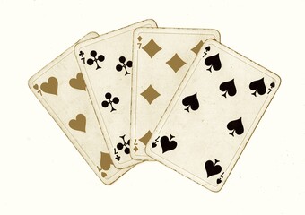 A hand of vintage playing cards showing four of the same value isolated on a white background.