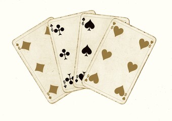 A hand of vintage playing cards showing four of the same value isolated on a white background.