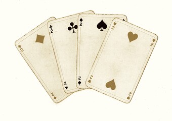 A hand of vintage playing cards showing four of the same value isolated on a white background.