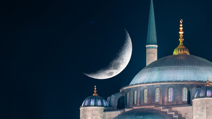 Ramadan or islamic concept image. Blue Mosque with crescent moon © senerdagasan