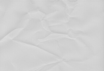 Obraz premium High-resolution white crumpled paper texture with soft folds and natural creases. Neutral background ideal for overlays, mockups, posters, packaging, editorial design, and minimalist compositions.