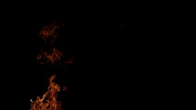 Huge flamethrower fireball burning isolated on black background