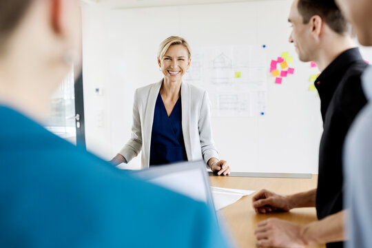 Businesswoman leading a meeting in office