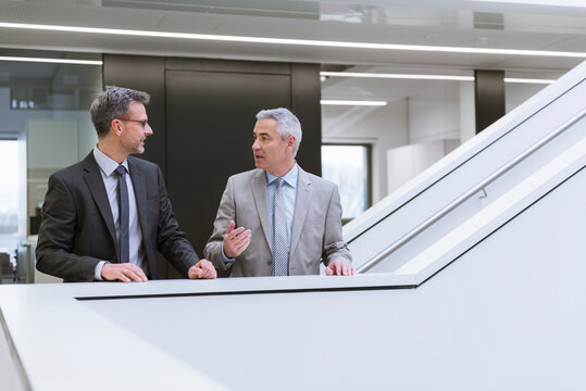 Two businessmen having an informal meeting