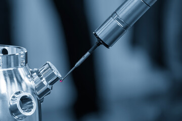 Multi-Axis CMM Machine Performing Dimensional Inspection on Automotive Parts