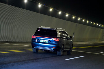 Obraz premium Chinese brand cars using Huawei's intelligent driving system are currently undergoing testing and trial drives.