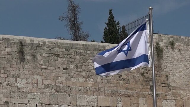 Israeli National Flag Waving in Jerusalem Near the Western Wall and Old City