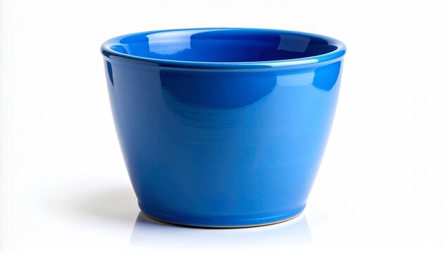 A vibrant blue ceramic flower pot with a glossy finish, perfect for indoor plants and home decoration. This empty planter is shown in a studio shot, isolated on a clean white background.