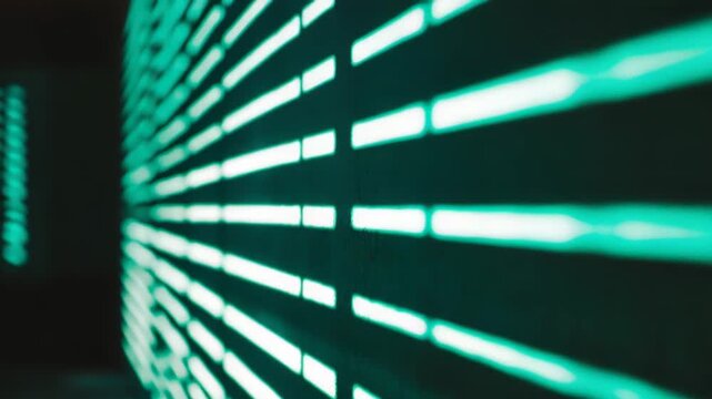 Bright green light stripes creating dynamic shadow patterns on a wall, forming an abstract composition suitable for modern backgrounds and design elements