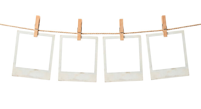 Molduras de fotos Polaroid com leves manhas de desgaste nas bordas em varal de corda com pregadores c, imagem com fundo transparente e centro da foto transparente png, sem fundo para mokup.