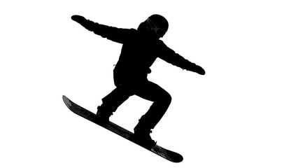 Fototapeta premium Silhouette of a snowboarder performing a trick mid-air.