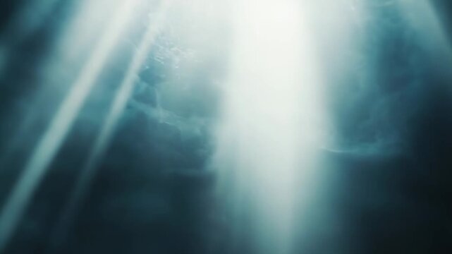 Bright light beams shine down from an ethereal source through a dark, mysterious background, creating a dramatic and spiritual scene with a concept of hope or divine intervention