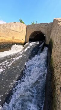 The Khadzhibey Estuary, Polluted water from a pipe from the "Irrigation Field" flows into the estuary
