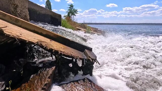 The Khadzhibey Estuary, Polluted water from a pipe from the "Irrigation Field" flows into the estuary