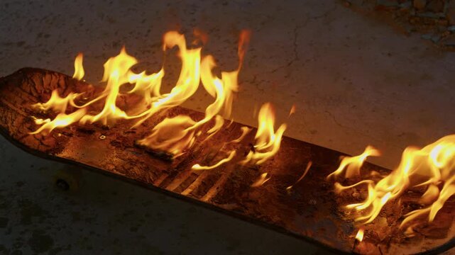 Skateboard engulfed in flames during daring tricks