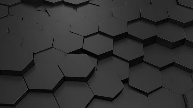 A geometric pattern of hexagonal tiles creating a textured, dimensional design in shades of black and gray