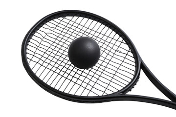 Close-up view of a dark gray tennis racket with a black ball centered on the strings