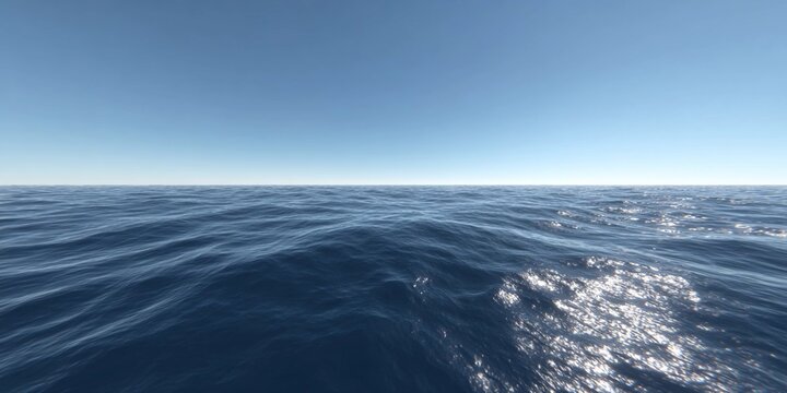Expansive view of ocean under a clear sky