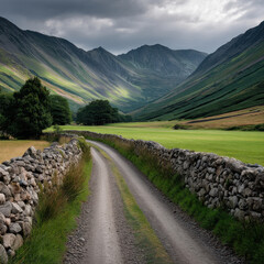 Obraz premium Mountain valley green landscape stone road rural scenic cloudy peaceful. winding stone road leads through lush green valley surrounded by dramatic