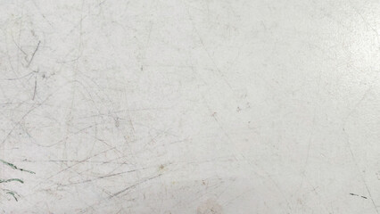 Fototapeta premium Close-Up of Scratched Kids Table Surface Showing Signs of Frequent Use and Play