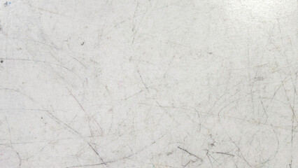 Close-Up of Scratched Kids Table Surface Showing Signs of Frequent Use and Play © MohamadFaizal