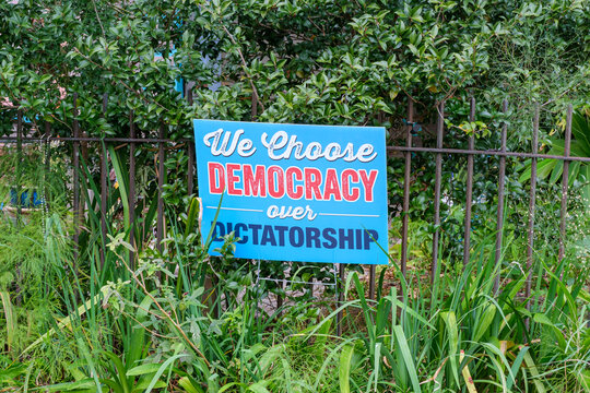 "We Choose Democracy over Dictatorship" Yard Sign in Residential Neighborhood of New Orleans, LA, USA