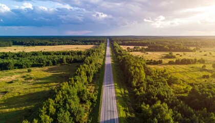 Fototapeta premium Aerial View of Road Through Natural Landscape