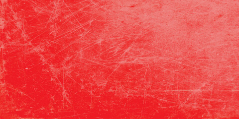 Fototapeta premium A vintage red grunge paint texture features a rough, textured surface with an old paper design that resembles a dirty cement wall or a close-up of raw beef material