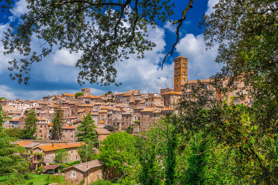 The old town of Sutri among clouds and trees, a beautiful medieval city near Rome, along the famous pilgrim route knows as 'Via Francigena'