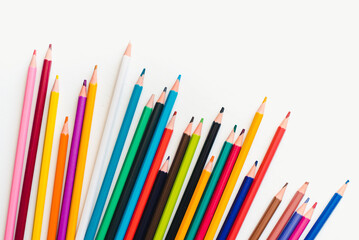 Fototapeta premium Colored pencils on a white background. Background of multicolored pencils.