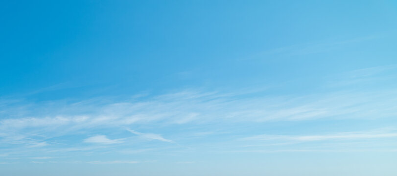 Blue Sky with Thin Cirrus Clouds on Left Side