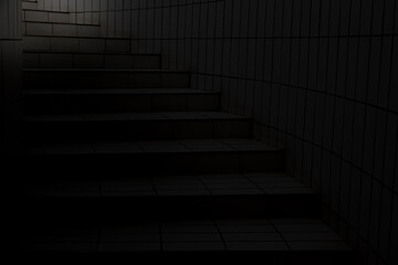 Dark Staircase with Dramatic Light in Tiled Passageway