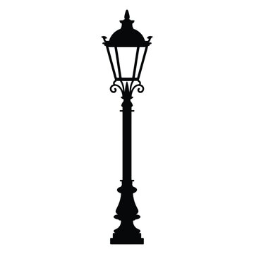 A detailed silhouette of an ornate vintage street lamp post