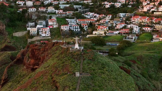 Ponta do Garajau, Madeira, Portugal,  The statue of Cristo Rei ("Christ the King") is located in Ponta do Garajau, not far from Funchal. This imposing Art Deco statue was completed in 1927
