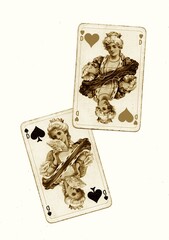 A pair of vintage playing cards of the same value in sepia on a white background.