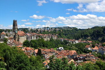 Fototapeta premium Panoramic view of the old town Fribourg, a european hillside town in Switzerland.