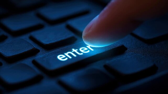 Finger Pressing Enter Key on Keyboard Technology Concept