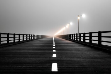 Obraz premium Ethereal Bridge Fading Away into Dense Fog with Glowing Lights