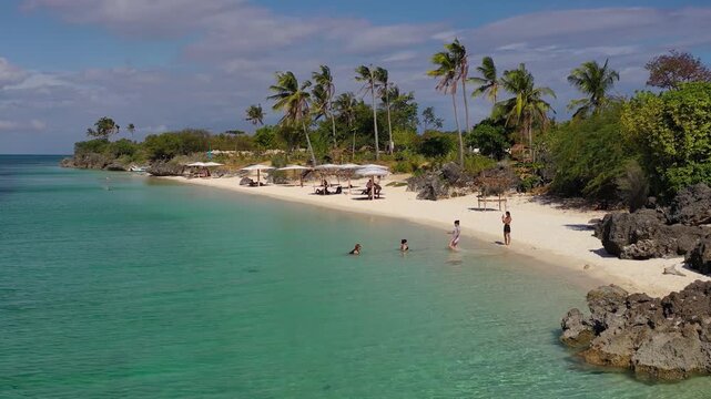 Aerial view of tropical beach with people