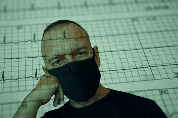 Worried adult male face over damaged electrocardiogram showing cardiac distress