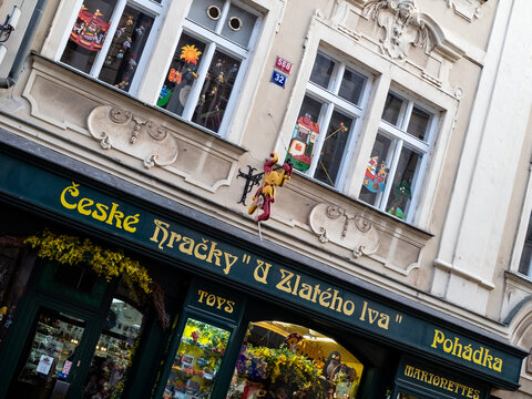 PRAGUE, CZECH REPUBLIC - JULY 17, 2019:  Exterior of Hracky U zlateho lva Toy and Puppet shop in the Old Town with sign