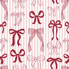 Seamless Pattern with red bows on a striped background 
