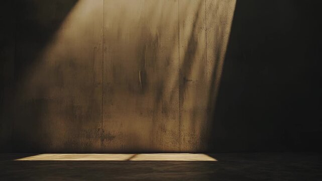 Empty concrete room with a textured wall and floor catching abstract patterns of natural light and shadows from an unseen window, representing concepts of hope, minimalism, and transition