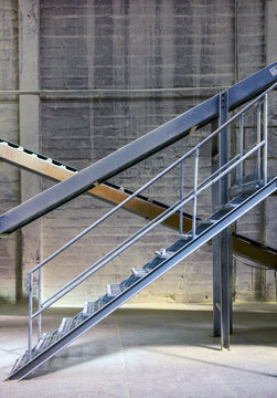 Industrial metal staircase inside a warehouse