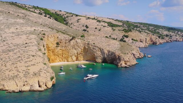 Rocky coast and boats near Zlata Beach